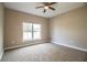 Bright bedroom with ceiling fan and window at 3671 E Gaskins Rd, Bartow, FL 33830