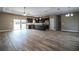 Open concept kitchen features island, stainless steel appliances, and dark cabinetry at 3671 E Gaskins Rd, Bartow, FL 33830