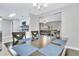 Dining area with a view into the living room and kitchen at 724 Hillside Ave, Lake Wales, FL 33853
