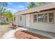 Updated ranch home with a covered entryway and landscaped yard at 724 Hillside Ave, Lake Wales, FL 33853