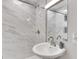 Clean bathroom with marble shower and pedestal sink at 724 Hillside Ave, Lake Wales, FL 33853