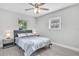 Bedroom with ceiling fan and window at 724 Hillside Ave, Lake Wales, FL 33853