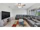 Relaxing living room with sectional sofa and wood-look floors at 724 Hillside Ave, Lake Wales, FL 33853