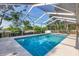 Relaxing screened pool area with lounge chairs at 724 Hillside Ave, Lake Wales, FL 33853