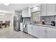 Modern kitchen with stainless steel appliances and granite countertops at 724 Hillside Ave, Lake Wales, FL 33853