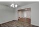 Bright dining room with light wood-look flooring and neutral walls at 318 Senate St, Auburndale, FL 33823