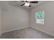 Well-lit bedroom with ceiling fan and carpeting at 318 Senate St, Auburndale, FL 33823