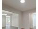 Open concept dining room with access to other rooms at 318 Senate St, Auburndale, FL 33823