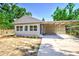 Updated single story home features a carport and well-maintained yard at 318 Senate St, Auburndale, FL 33823