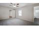 Bedroom with access to bathroom and additional rooms at 318 Senate St, Auburndale, FL 33823