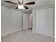 Spacious bedroom with double closets and ceiling fan at 318 Senate St, Auburndale, FL 33823