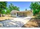 Charming house with covered carport and landscaped yard at 318 Senate St, Auburndale, FL 33823