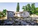 Gray house with a spacious backyard at 318 Senate St, Auburndale, FL 33823