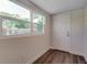 Small office space with new vinyl plank flooring and fresh paint at 318 Senate St, Auburndale, FL 33823