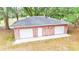 Brick detached garage with three bays and a spacious layout at 3479 Arrowwood Dr, Lakeland, FL 33811