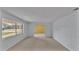 Bright living room featuring neutral walls and carpet at 3479 Arrowwood Dr, Lakeland, FL 33811