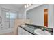 Bathroom with double vanity and shower/tub combo at 3479 Arrowwood Dr, Lakeland, FL 33811