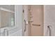 Walk-in shower with grab bars and updated tile at 3479 Arrowwood Dr, Lakeland, FL 33811