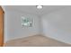 Bright bedroom with carpet and a window at 3479 Arrowwood Dr, Lakeland, FL 33811