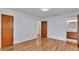 Bedroom with wood floors and access to bath at 3479 Arrowwood Dr, Lakeland, FL 33811