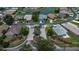 Aerial view of community entrance with landscaping and lake at 6118 Silver Lakes W Dr, Lakeland, FL 33810