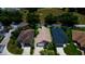 An aerial view of three homes in a residential area at 6118 Silver Lakes W Dr, Lakeland, FL 33810