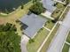 Aerial view of house and surrounding lakefront property at 745 Square Lake E Dr, Bartow, FL 33830