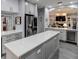 Spacious kitchen with large island, stainless steel appliances, and wine cooler at 745 Square Lake E Dr, Bartow, FL 33830