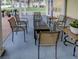 Spacious screened porch with seating area and lake view at 745 Square Lake E Dr, Bartow, FL 33830