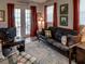 Functional home office with comfortable futon and French doors at 745 Square Lake E Dr, Bartow, FL 33830