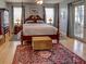 Spacious main bedroom with king-size bed and ample natural light at 745 Square Lake E Dr, Bartow, FL 33830
