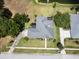 Aerial view of house, showcasing the roof and driveway at 745 Square Lake E Dr, Bartow, FL 33830