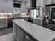 Modern kitchen with large island, stainless steel appliances, and ample cabinet space at 745 Square Lake E Dr, Bartow, FL 33830
