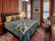 Cozy bedroom with comfortable bedding and charming decor at 745 Square Lake E Dr, Bartow, FL 33830