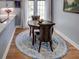 Cozy breakfast nook with round table and two chairs at 745 Square Lake E Dr, Bartow, FL 33830