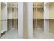 Spacious walk-in closet with ample shelving and hanging space at 8288 Lake James Dr, Lakeland, FL 33810