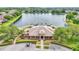 Lake James community pool area with clubhouse and lake view at 8288 Lake James Dr, Lakeland, FL 33810