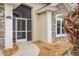 Inviting entryway with a screened porch at 8288 Lake James Dr, Lakeland, FL 33810