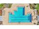 Community pool with two lanes and plenty of lounge chairs at 8288 Lake James Dr, Lakeland, FL 33810