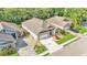 Aerial view of a single-Gathering house in a residential area at 8288 Lake James Dr, Lakeland, FL 33810