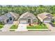 Aerial view of a single-Gathering house in a residential area at 8288 Lake James Dr, Lakeland, FL 33810