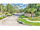 Lake James gated entrance with landscaping and signage at 8288 Lake James Dr, Lakeland, FL 33810