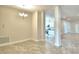 Bright dining room with tile floors and kitchen view at 5500 Knights Landing Dr, Lakeland, FL 33810