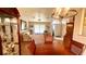 Bright dining area with wooden table and adjacent living room at 5879 Swallow Dr, Lakeland, FL 33809