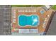 Community pool with surrounding patio and lounge chairs at 5879 Swallow Dr, Lakeland, FL 33809