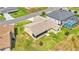 Single-story house with screened porch and grassy backyard at 5879 Swallow Dr, Lakeland, FL 33809