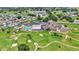 Aerial view of community amenities including pool and golf course at 5879 Swallow Dr, Lakeland, FL 33809