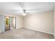 Spacious bedroom with sliding doors to a private patio at 2025 Sylvester Rd # C4, Lakeland, FL 33803