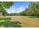 Tennis court with surrounding green space at 2025 Sylvester Rd # C4, Lakeland, FL 33803