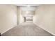 Open living area with high ceilings and neutral walls at 2025 Sylvester Rd # C4, Lakeland, FL 33803